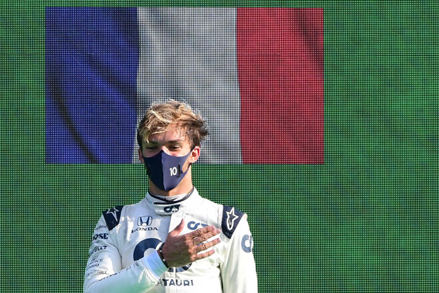Winner AlphaTauri's French driver Pierre Gasly celebrates on the podium after the Italian Formula One Grand Prix at the Autodromo Nazionale circuit in Monza on Sunday (AFP photo)