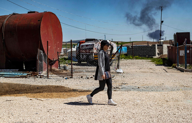 In this file photograph taken on March 28 Frenchwoman Emilie Konig walks in Camp Al Roj, north-eastern Syria (AFP photo)
