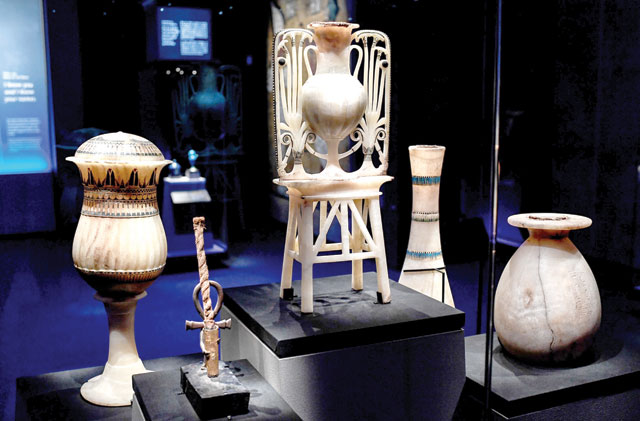 Objects are displayed during the exhibition 'Tutankhamun, Treasures of the Golden Pharaoh' in Paris on Thursday (AFP photo)