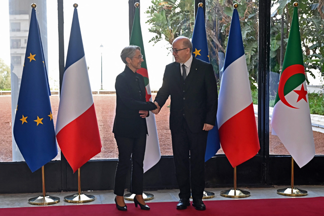 Algeria's Prime Minister Aymen Benabderrahmane (right) welcomes his French counterpart Elisabeth Borne at the government palace in the capital Algiers on Sunday (AFP photo)