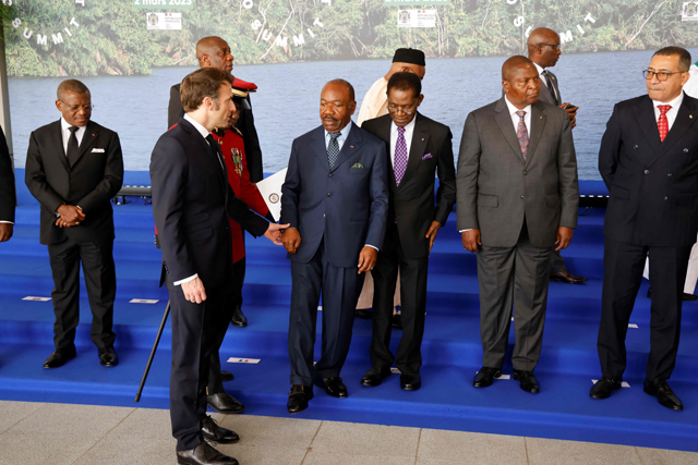 From second right to left: French President Emmanuel Macron, Gabon’s President Ali Bongo, Equatorial Guinea President Teodoro Obiang Nguema Mbasogo and Central African Republic President Faustin-Archange Touadera leave after the family photo of the One Forest Summit at the Presidential Palace in Libreville, on Thursday (AFP photo)