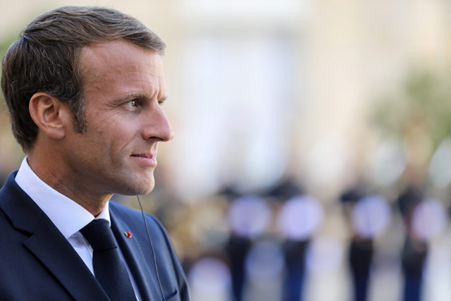 French President Emmanuel Macron gives a joint press conference with Finnish prime minister at the Elysee presidential palace in Paris, on Wednesday  (AFP photo)