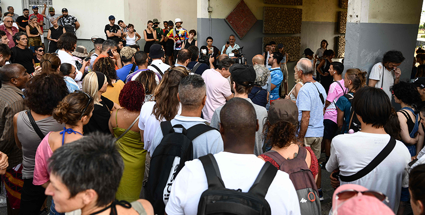 People gather in tribute to Mohamed B. at the cite Air-Bel in Marseille, southern France, on Thursday (AFP photo)