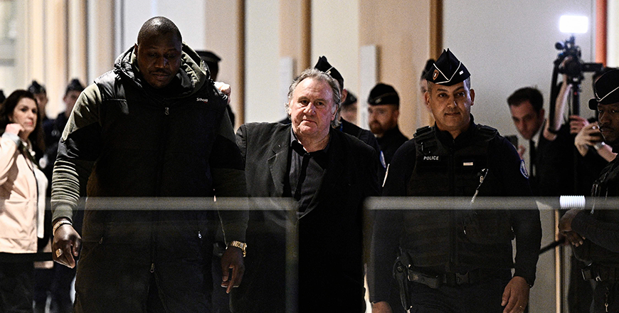 French actor Gerard Depardieu walks during a suspension of hearing as part of his trial in which he is accused of sexually abusing two women during a film shoot in 2021, at the Paris criminal court in the Tribunal de Paris courthouse, on Monday (AFP photo)
