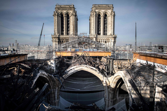 A photograph taken on Tuesday in Paris shows the melted scaffolding on the roof of Notre-Dame cathedral during reconstruction works (AFP photo)