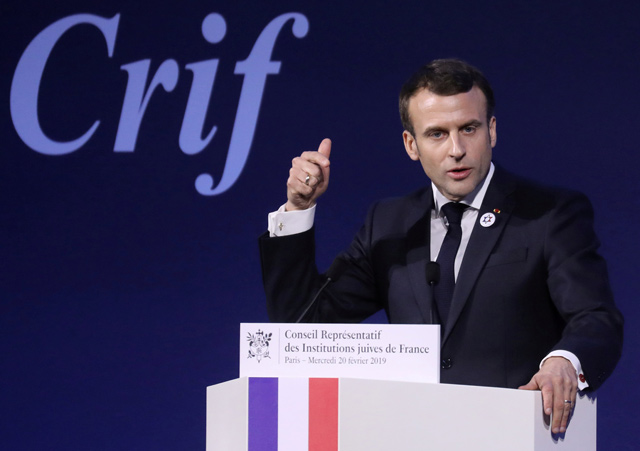 French President Emmanuel Macron speaks during the 34th annual dinner of the Representative Council of Jewish Institutions of France at the Louvre Carrousel in Paris on Wednesday (Reuters photo)