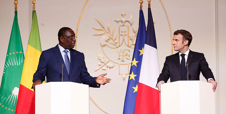 French President Emmanuel Macron (right), with Senegal's President Macky Sall, holds a joint press conference on France's engagement in the Sahel region, at the Elysee Palace, in Paris on Thursday (AFP photo)