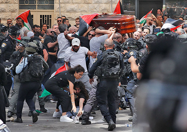 Deputy Prime Minister and Foreign Minister Ayman Safadi on Friday strongly denounced the 'inhumane and hateful Israeli attacks' on participants in the funeral of veteran Palestinian journalist Shireen Abu Akleh (AFP photo)