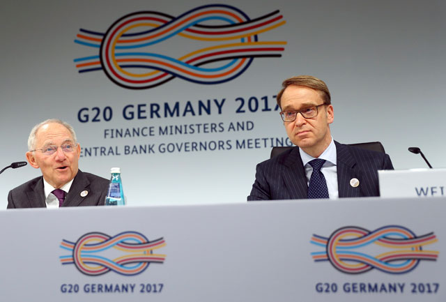 German Bundesbank President Jens Weidmann and German Finance Minister Wolfgang Schaeuble (left) address a news conference at the G-20 Finance Ministers and Central Bank Governors Meeting in Baden-Baden, Germany, on Saturday  (Reuters photo)