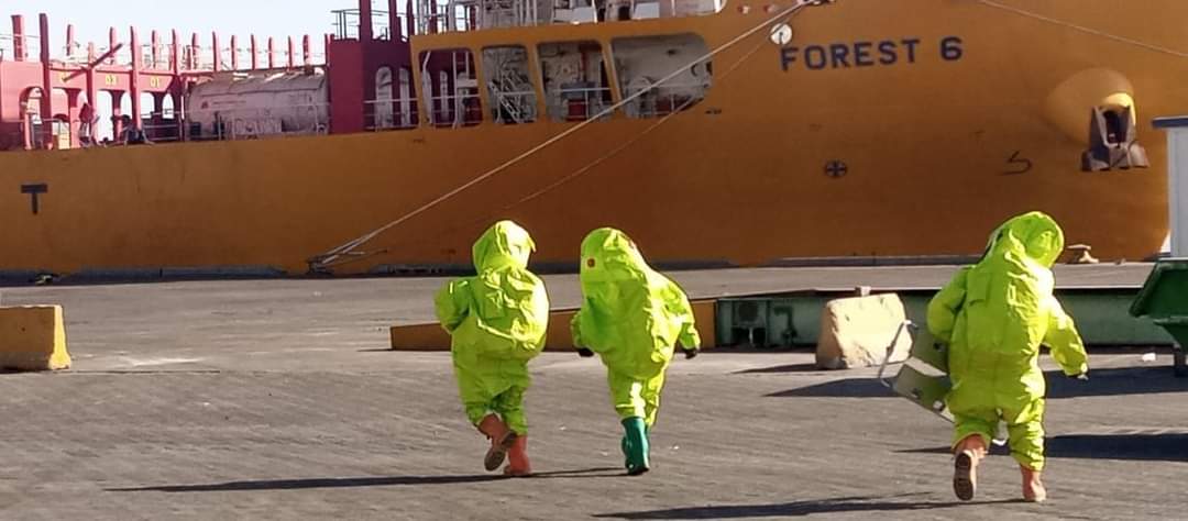 Emergency response team members are seen at the Aqaba port following an emergency gas leak Monday (Petra photo) 