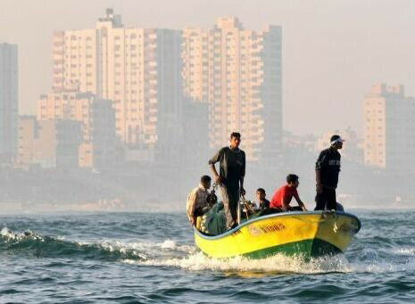 In this undated photo fishermen set sail near the Gaza shore (AFP photo)