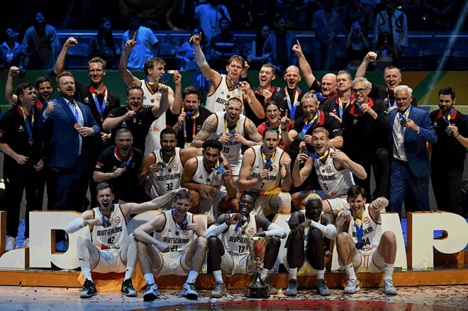 Germany's players celebrate after winning the FIBA  World Cup final game against Serbia in Manila, on Sunday (AFP photo)