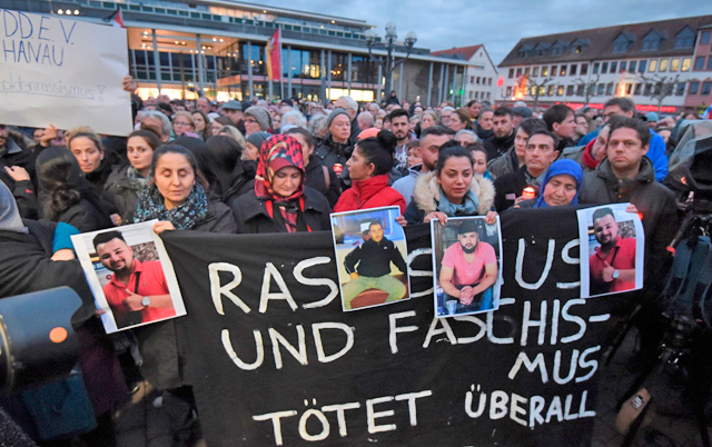 Mourners take part in a vigil in Hanau, near Frankfurt am Main, western Germany, on Thursday (AFP photo)