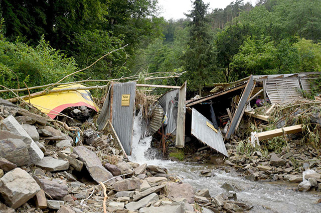 Debris lie around after floods caused major damage in Hagen, western Germany, on Thursday (AFP photo)