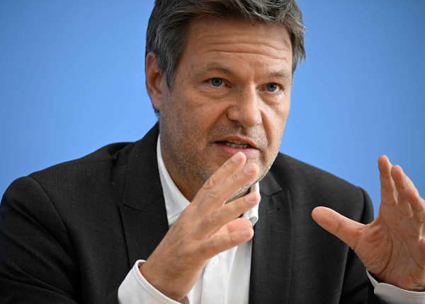 German Minister of Economics and Climate Protection Robert Habeck presents the autumn forecasts during a press conference in Berlin on Wednesday (AFP photo)