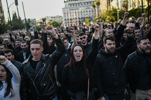 Demonstrators shout slogans during a march towards the US embassy to commemorate the 1973 students' uprising against the Washington-backed military junta in Athens on Sunday (AFP photo)