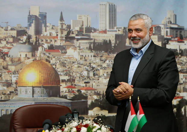 Senior Hamas leader Ismail Haniyeh gestures before delivering a farewell speech for his former position as a Hamas government prime minister in Gaza City on June 2, 2014 (Reuters photo)