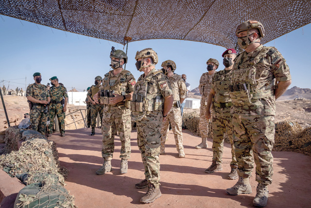 His Majesty King Abdullah, the Supreme Commander of the Jordan Armed Forces-Arab Army, attends a tactical exercise by the 61st Raiders Battalion of the Sheikh Mohamed Bin Zayed Quick Reaction Force Brigade on Wednesday (Photos courtesy of Royal Court)
