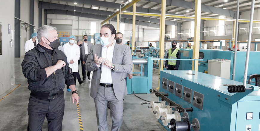 His Majesty King Abdullah visits Technical Fibre Optics Lines factory (techline) on Sunday (Photo courtesy of Royal Court)