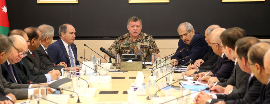 His Majesty King Abdullah chairs part of a Cabinet meeting at the National Centre for Security and Crisis Management in Amman on Wednesday  (Photo courtesy of Royal Court)