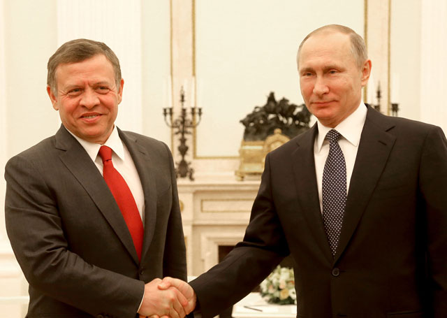 His Majesty King Abdullah is received by Russian President Vladimir Putin in Moscow on Wednesday (Photo courtesy of Royal Court)