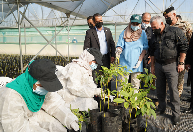 His Majesty King Abdullah visits a farm that utilises modern agricultural methods in the Jordan Valley on Monday (Photo courtesy of Royal Court) 