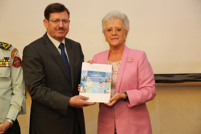 HRH Princess Muna presents Health Minister Mahmoud Sheyyab with  the UN High-Level Commission on Health Employment and Economic Growth report on Wednesday (Photo courtesy of Jordan Nursing Council)