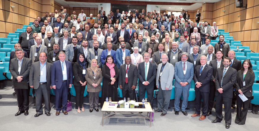 HRH Princess Sumaya and participants pose for a photo during a workshop to discuss ways to evaluate and rehabilitate existing concrete facilities hosted by the Royal Scientific Society on Saturday (Petra photo)