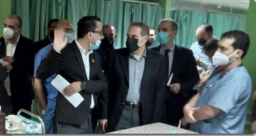 Health Minister Feras Al Hawwari checks on the health condition of nine children at Jerash Public Hospital on Saturday (Photo courtesy of Health Ministry Facebook)