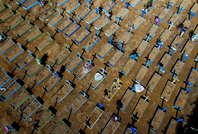  In this file photo taken on April 15, graves of COVID-19 victims are seen at the Nossa Senhora Aparecida cemetery in Manaus, Amazon state, Brazil  (AFP photo)