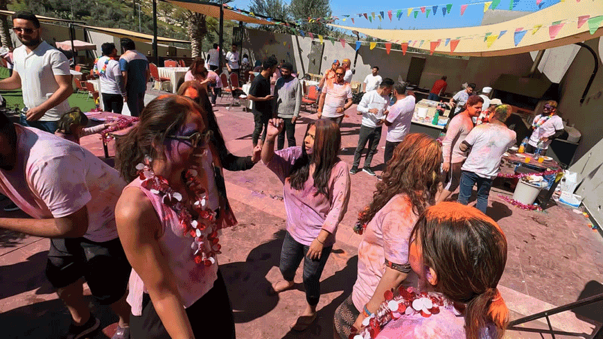 Participants during Holi celebrations at a venue north of Amman on Friday (Photo courtesy of the Indian Society in Jordan)