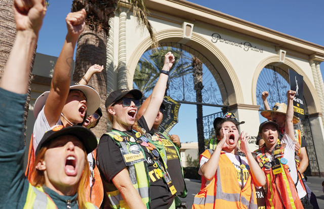 AFTRA members chant outside Paramount Studios on day 118 of their strike against the Hollywood studios on November Wednesday in Los Angeles, California (AFP photo)