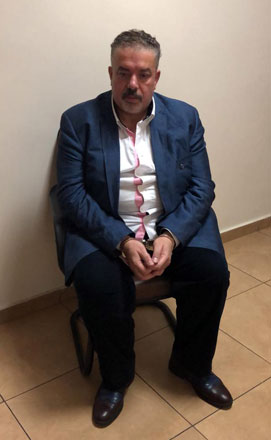 Fugitive Awni Mutee is seen after he was extradited by Turkey to Jordan on Monday night (Photo courtesy of Prime Ministry)