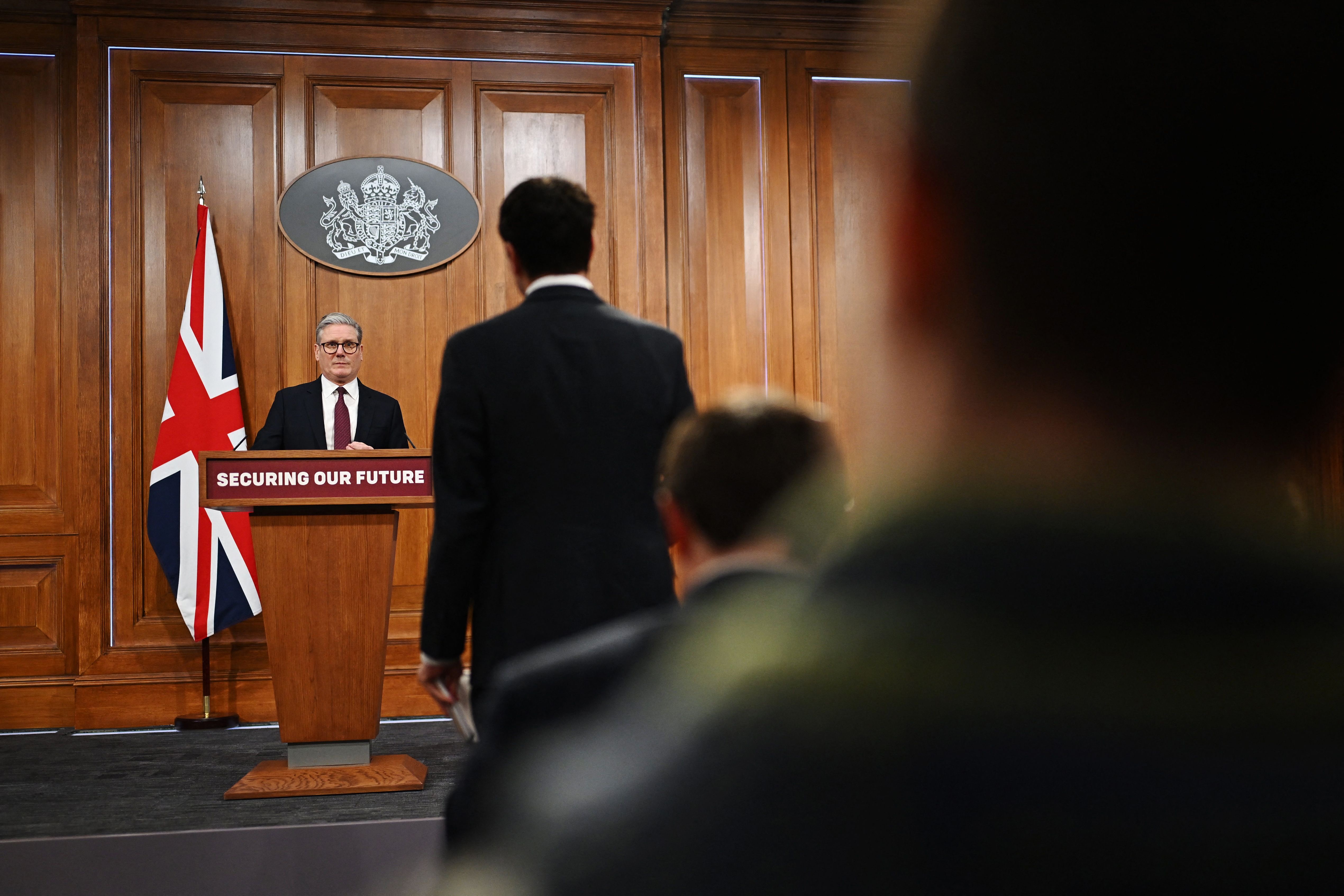Britain's Prime Minister Keir Starmer takes questions from members of the media at a press conference in the Downing Street Briefing Room after hosting virtual meeting with international leaders to discuss support for Ukraine, in central London today (AFP photo)
