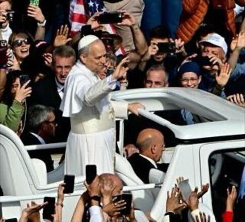 Pope Leo XIV greets the crowd from the popemobile before a Holy mass for the beginning of his pontificate, in St Peter's square in The Vatican on May 18, 2025 (AFP photo)
