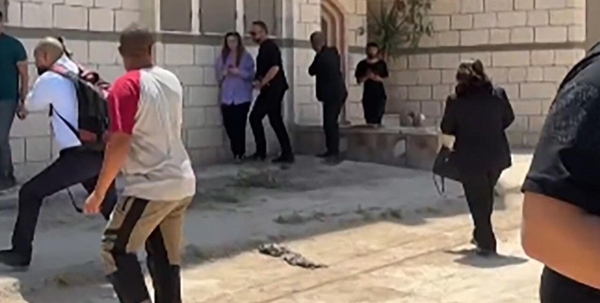 This frame grab from AFPTV footage shows members of a diplomatic delegation from the European Union reacting after shots were fired as they gathered in the eastern entrance of Jenin (AFP photo)