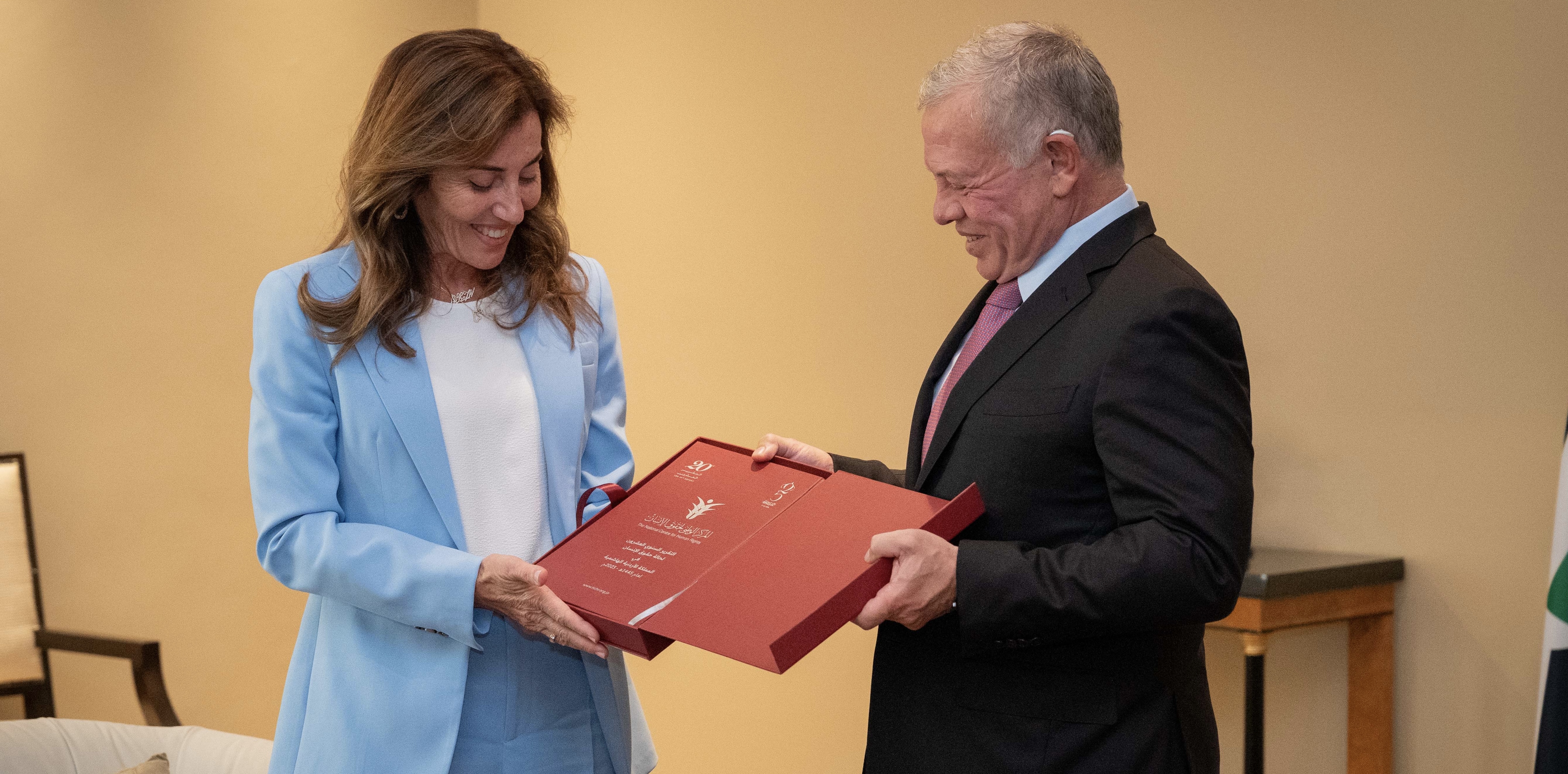 His Majesty King Abdullah receives a copy of the 20th annual reporton the status of human rights in Jordan for the year 2023 from the National Centre for Human Rights (Photo courtesy of Royal Court) 