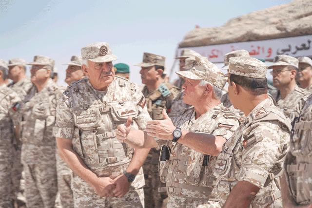 His Majesty King Abdullah, the Supreme Commander of the Jordan Armed Forces-Arab Army, attends a tactical military exercise conducted by the Central Military Region’s 51st Hashemite Mechanised Brigade on Monday (Photo courtesy of Royal Court)