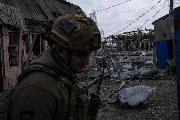 In this handout photograph taken on March 13, 2025 and released on March 14, 2025 by the press service of the 93rd Kholodnyi Yar Separate Mechanized Brigade of the Ukrainian Ground Forces, a Ukrainian serviceman stands among debris in an abandoned area in Pokrovsk, Donetsk region (AFP photo)