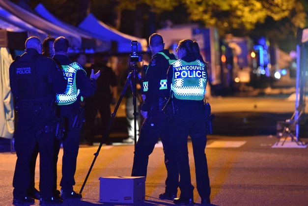 Vancouver police investigate a crime scene after a man drove into pedestrians at the annual Lapu Lapu festival celebrating Filipino culture, at East 43rd Avenue and Fraser, in the south of Vancouver on April 26, 2025