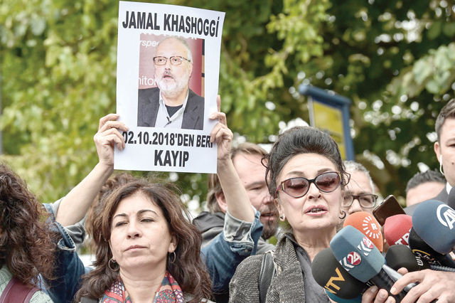 President of Human Rights Association Eren Keskin (right) speaks to journalists during a demonstration in front of the Saudi Arabia consulate in Istanbul, in support of missing journalist and Riyadh critic Jamal Khashoggi, on October 9 (AFP photo)