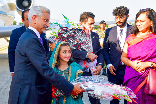 In this handout photo taken on Tuesday, and released by Pakistan’s Press Information Department, India’s Foreign Minister Subrahmanyam Jaishankar (left) is greeted upon his arrival at the Nur Khan Airbase in Rawalpindi (AFP photo)