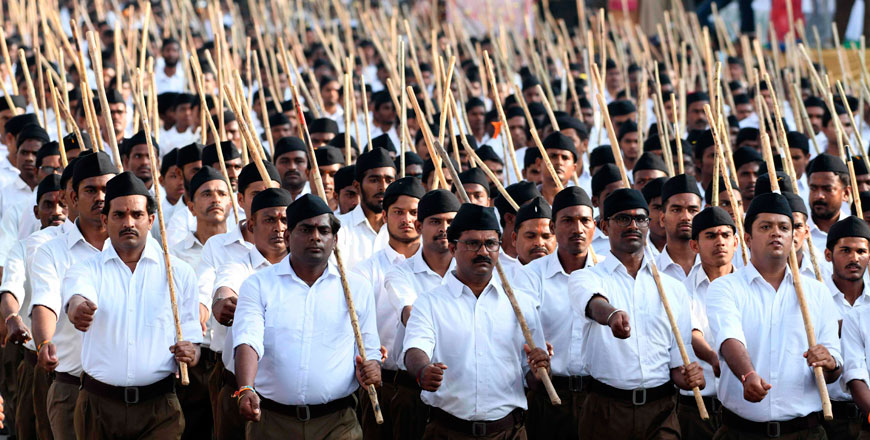 In this photo taken on Wednesday, members of the Rashtriya Swayamsevak Sangh participate in a rally in support of India's new citizenship law on the outskirts of Hyderabad (AFP photo)