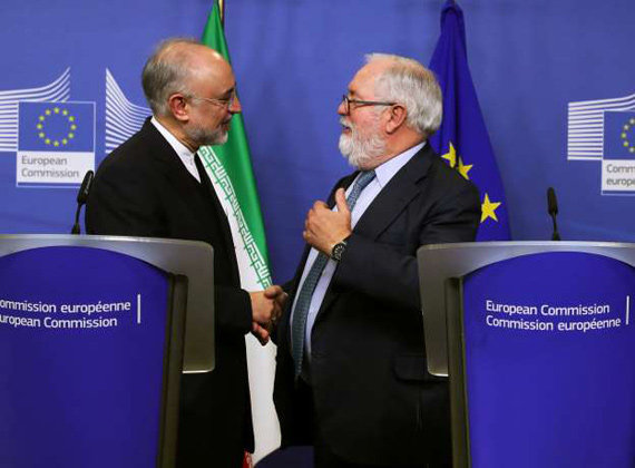 Iran's nuclear chief Ali Akbar Salehi attends a joint news conference with EU Energy  Commissioner Miguel Arias Canete at the EC headquarters in Brussels, Belgium, on Monday (Reuters photo)