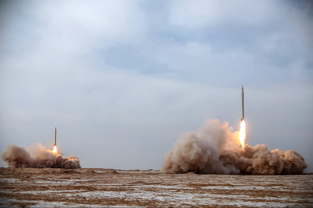 This handout photo provided by Iran's Revolutionary Guard Corps official website via SEPAH News on Saturday, shows a launch of missiles during a military drill in an unknown location in central Iran (AFP photo)