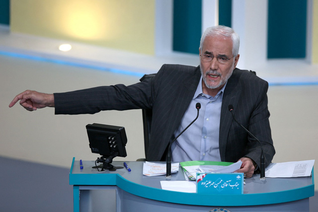 This handout photo made available by the Iranian Young Journalist Club (YJC) shows Iran’s presidential candidate Mohsen Mehralizadeh, during the third televised debate ahead of the June 18 election, at the Iran State television studio in Tehran, on Saturday (AFP photo)