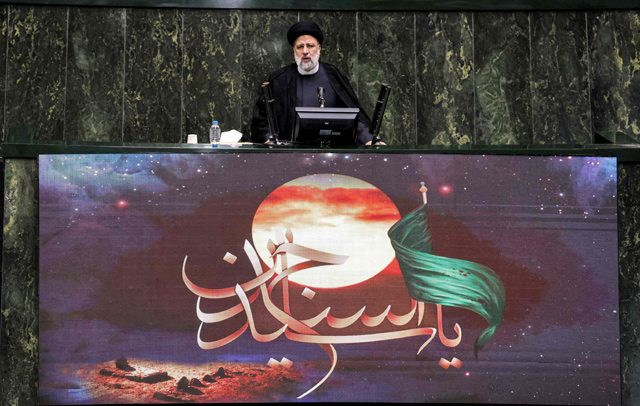Iran’s President Ebrahim Raisi speaks before parliament to defend his Cabinet selection in the capital Tehran, on Saturday (AFP photo)