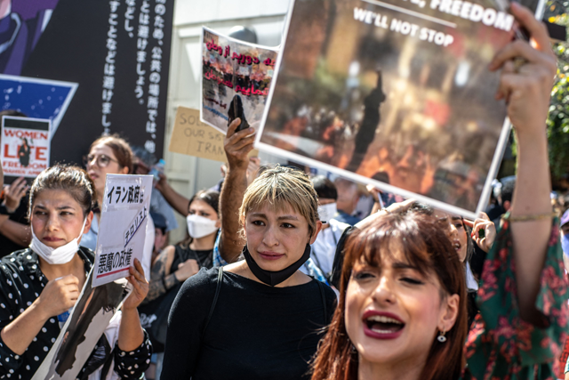 People chant slogans during the ‘Freedom rally for Iran’ event in Shibuya district of Tokyo on Saturday (AFP photo)
