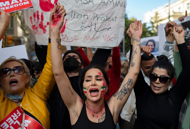Demonstrators chant slogans during a rally outside the Iranian consulate in Istanbul on Monday after the death of Iranian Mahsa Amini, five weeks ago (AFP photo)