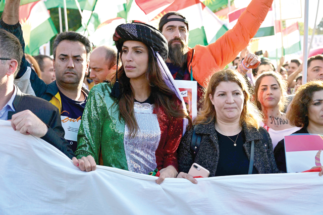 Protesters take part in a rally in support of the demonstrations in Iran, in Berlin on Saturday (AFP photo)